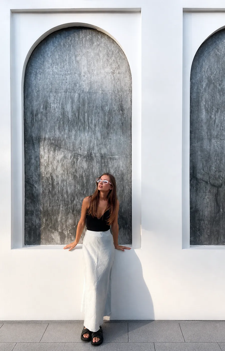 Marta with textured wall
